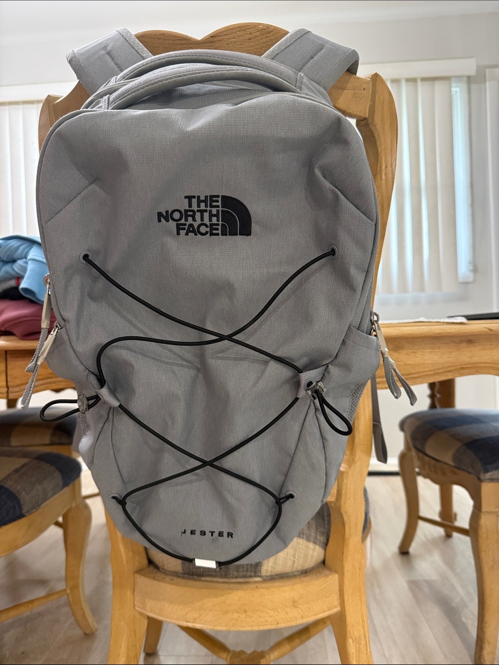 The North Face Light Gray Jester Backpack with Black Bungee